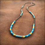 Load image into Gallery viewer, Long Snake Glass Necklace - Sunshine, Chevron Trade Bead
